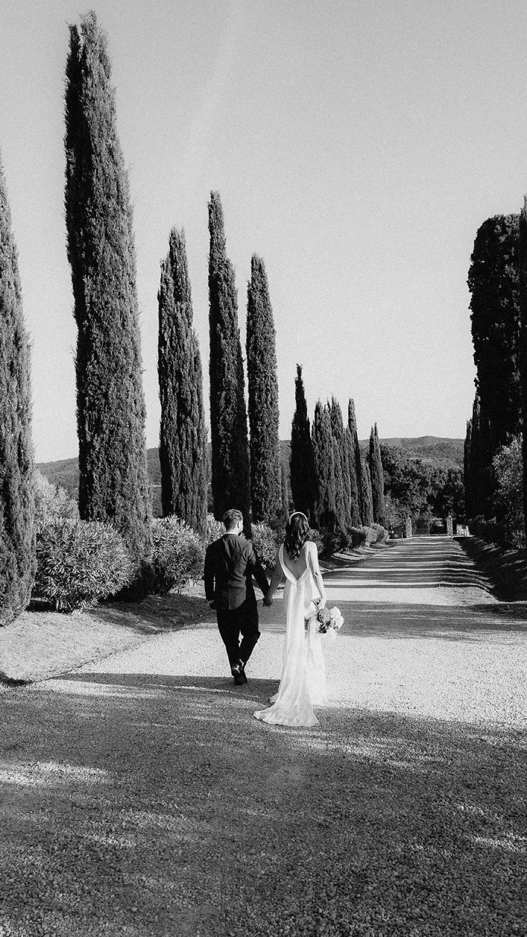 Editorial wedding portrait of the couple during a destination wedding in Tuscany.