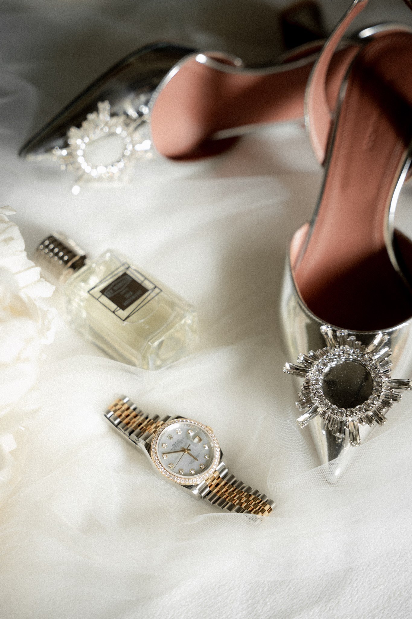 Wedding details at Schloss Duttenstein — watch, perfume and heels