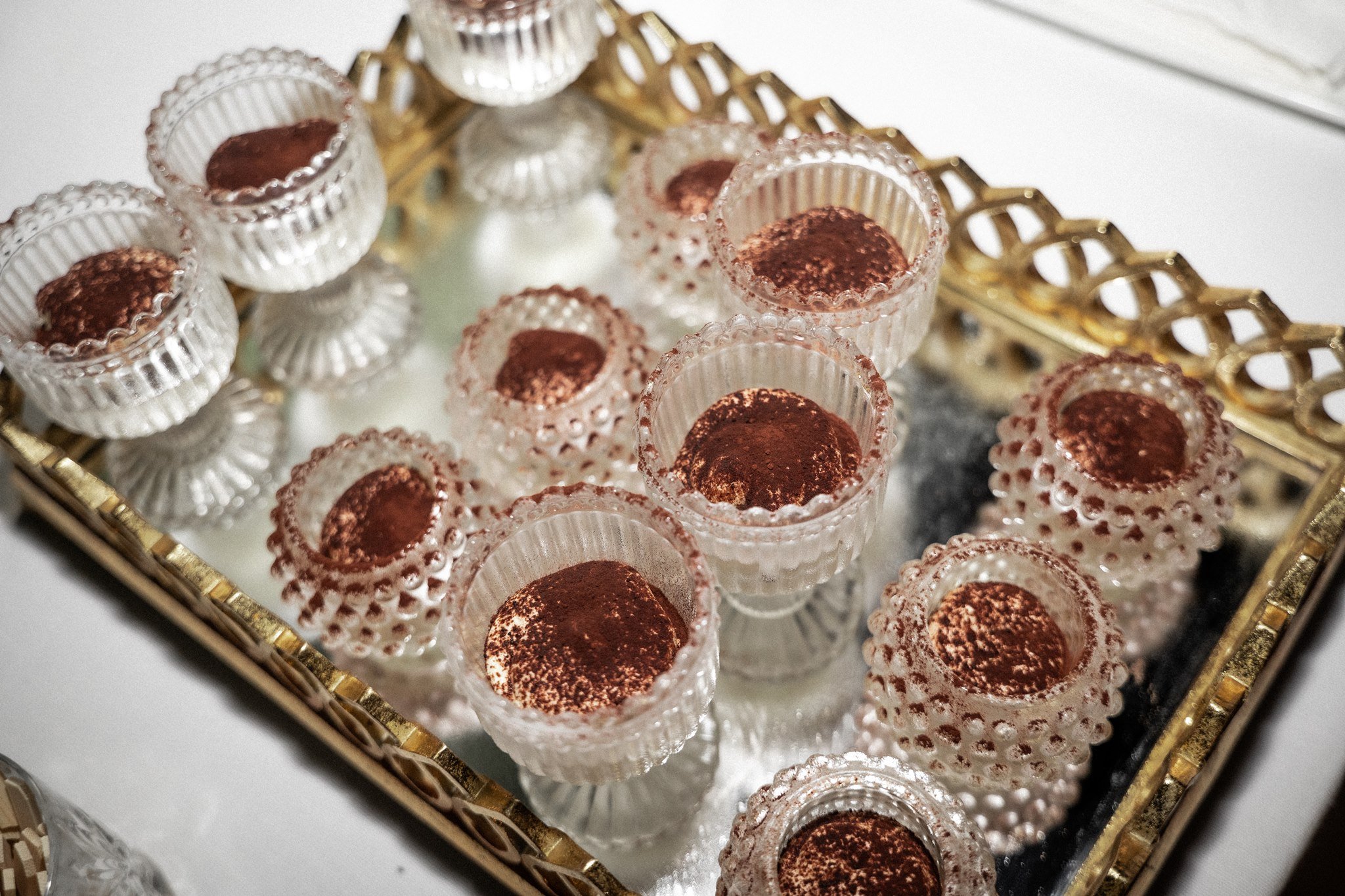 Tiramisu dessert on a gilded mirror tray at Schloss Duttenstein