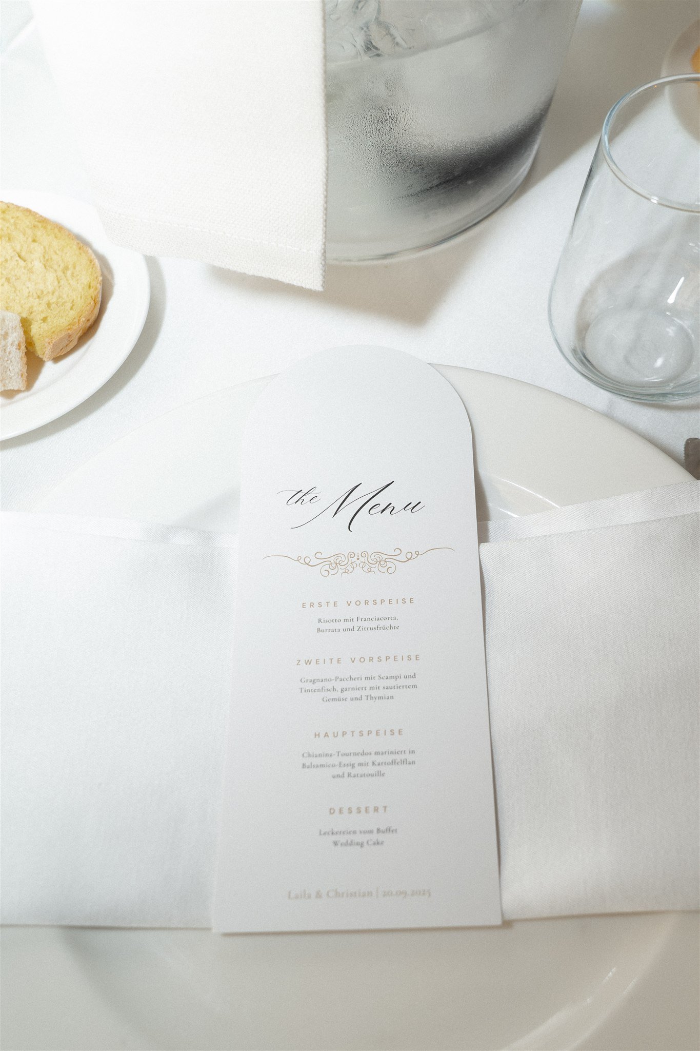 Wedding menu card on a linen table setting